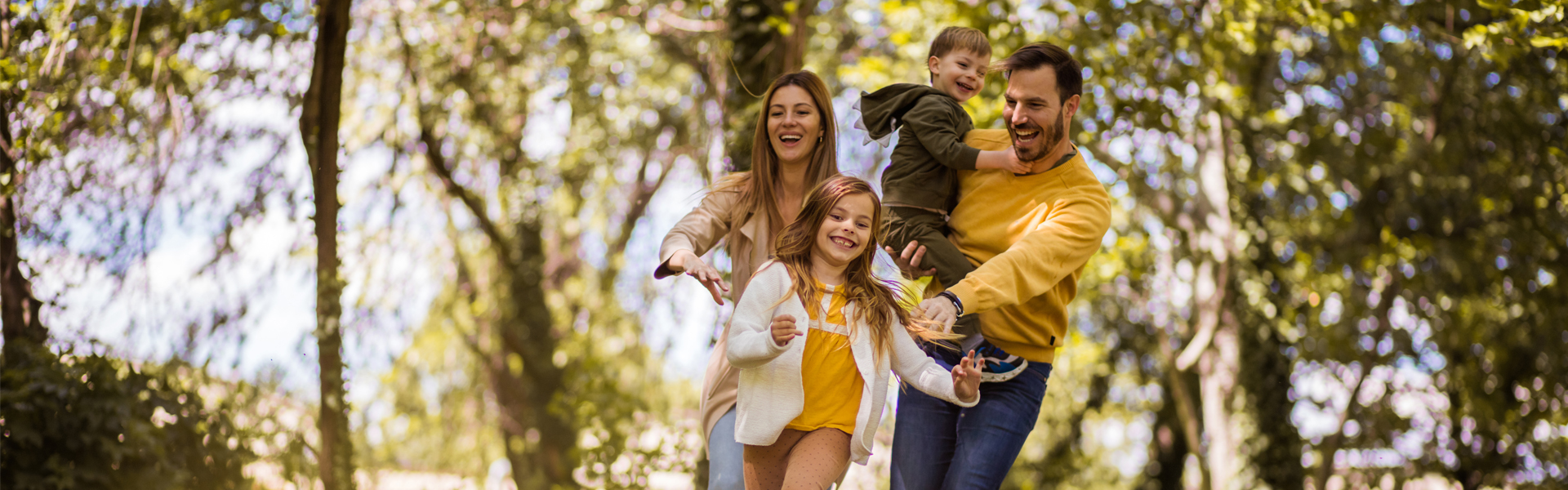 happy family running outside