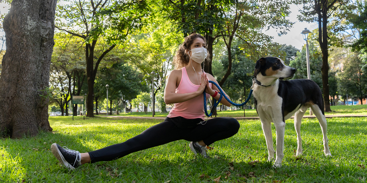 Woman exercising with dog