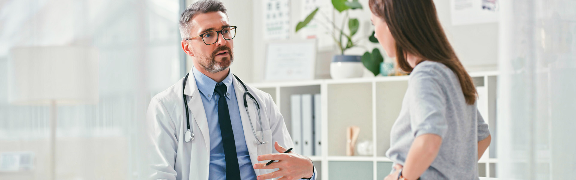 Doctor with female patient