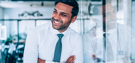 man-smiling-at-work