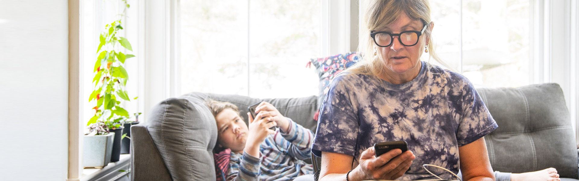 Mom with teen on couch