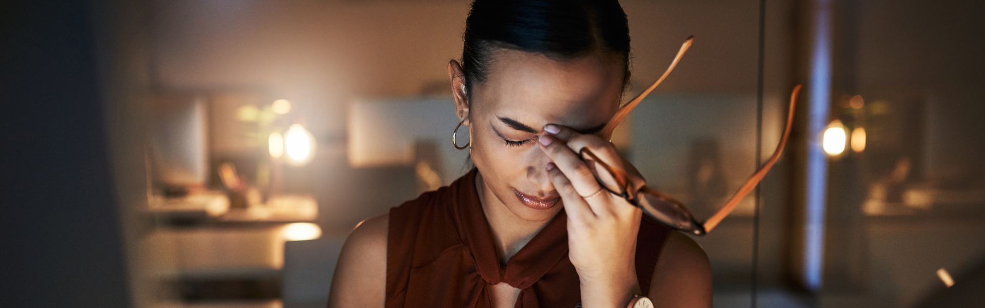 stressed woman in glasses