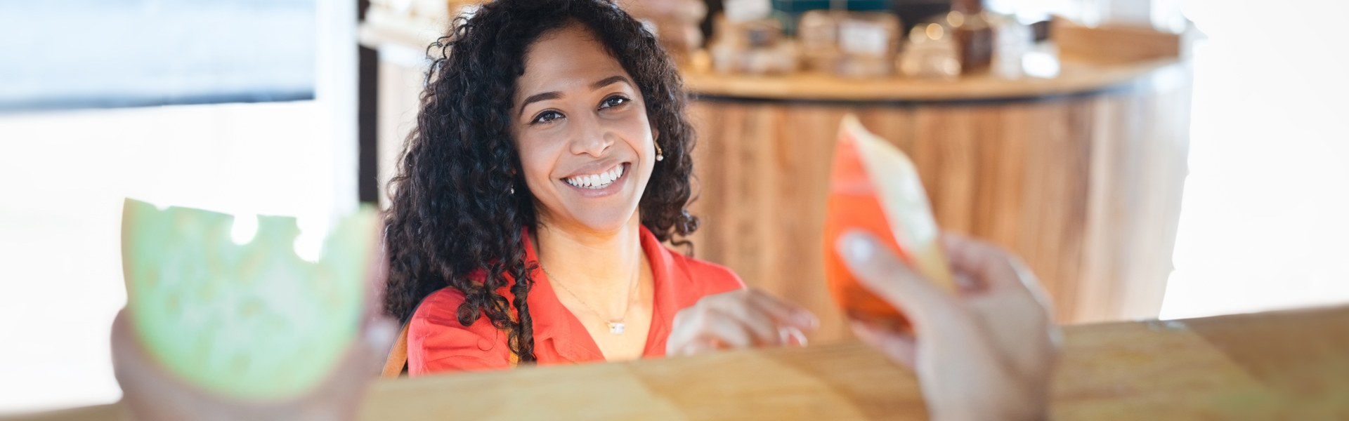 Woman sampling cheese